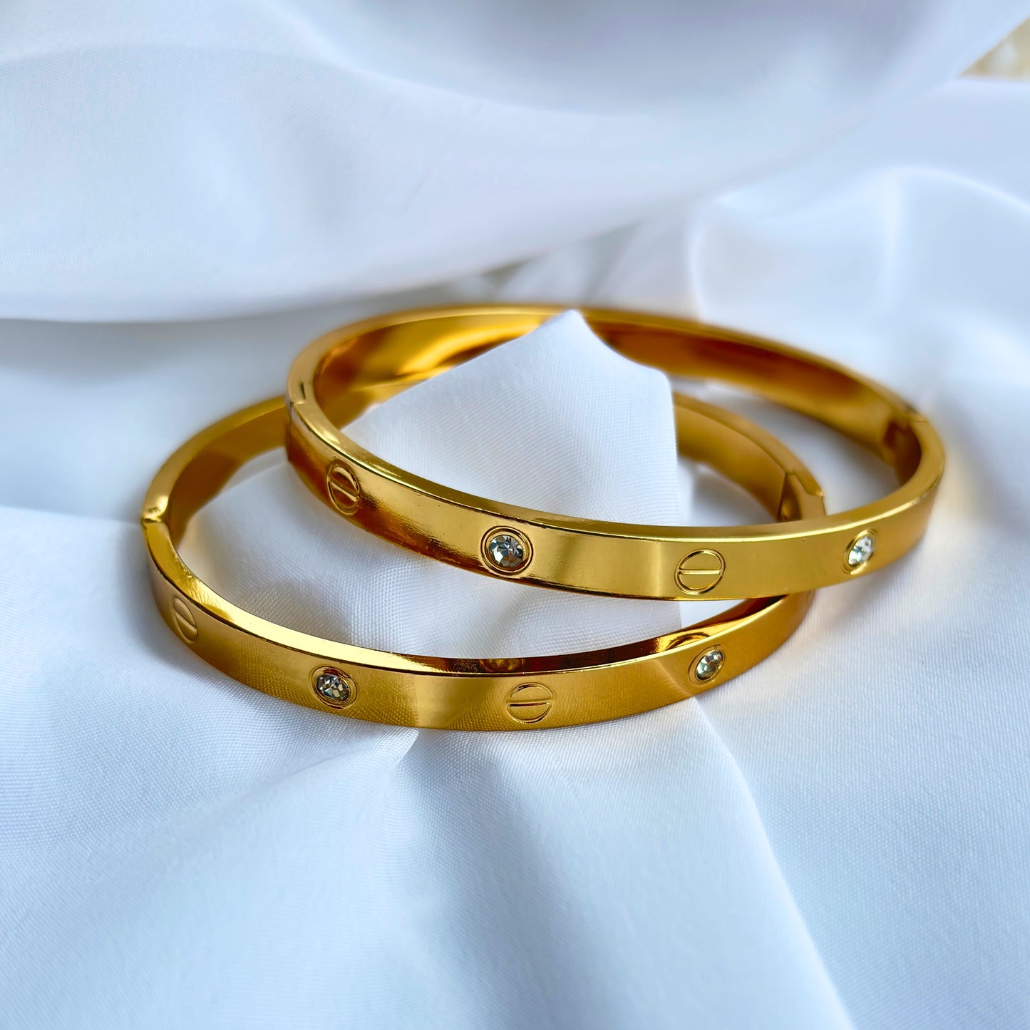 Trendy Gold-Plated Screw Design Bangles with Stone Detailing