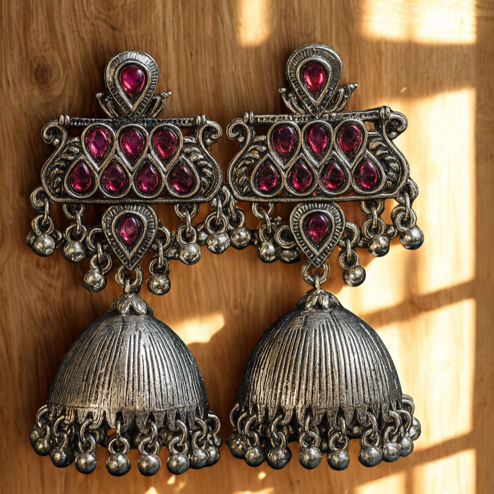 Trendy Gold Plated Antique Jhumka Earrings with Magenta Stones