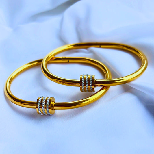 Trendy Gold-Plated Bangles with Triple Stone Ring Accent